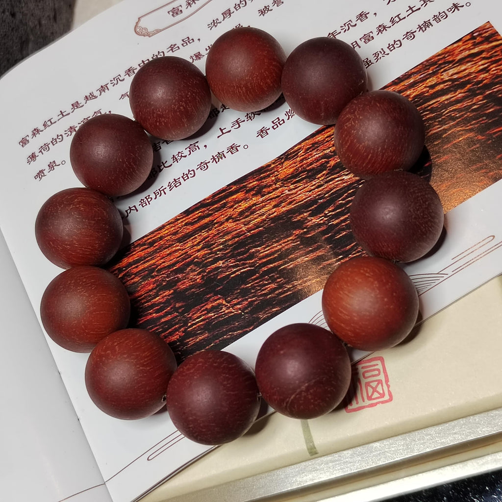 Wooden beaded bracelet on a decorative card with text